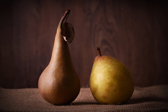 Fresh pears on sackcloth background