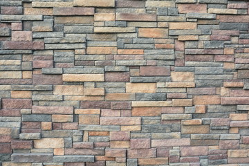 The Rock wall divider keeps things in and things out.