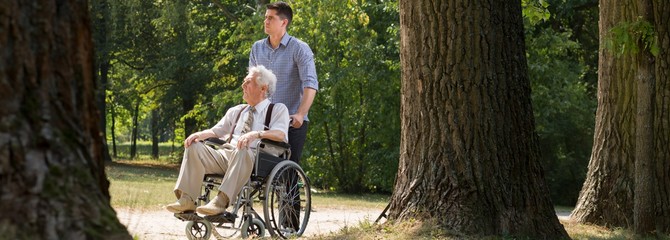 Man is helping grandfather