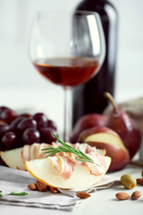 Still life with various types of Italian food and wine