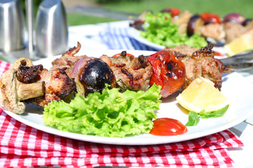 Barbecue served on plate outdoor