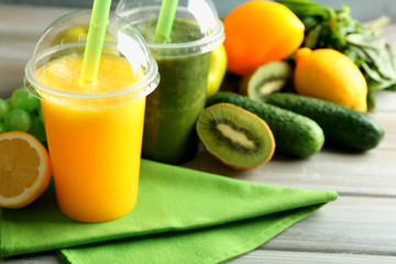 Fresh juice mix fruit, healthy drinks on wooden table, on bright background