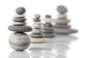 Group of alanced piles of different river stones