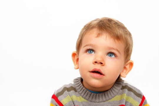 Boy In Winter Clothes Looking Up Amazed