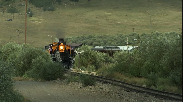 Steam Train to Camera in Valley