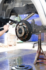 Washing pick-up suspension with water jet