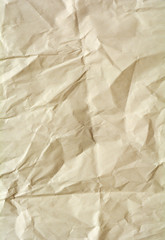 White crumpled paper for background. Brown and yellow textured grunge surface for design.