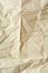 White crumpled paper for background. Brown and yellow textured grunge surface for design.