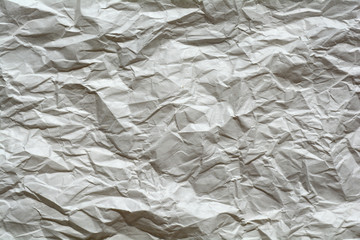 White crumpled paper for background. Brown and yellow textured grunge surface for design.