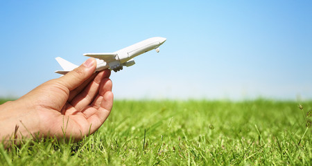 Woman hand holding a model plane