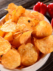 Paprika Potato Chips on rustic background