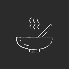 Bowl of hot soup with spoon icon drawn in chalk.