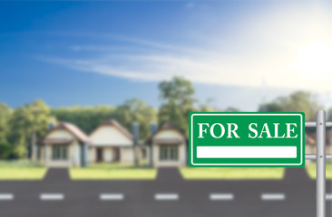 Fototapeta premium Home For Sale with green for sale sign