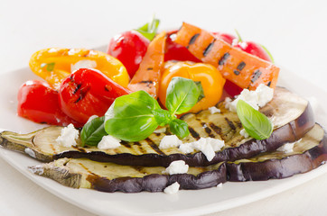 Grilled vegetables on a white plate. Healthy food.
