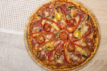 Pizza with peppers and tomatoes