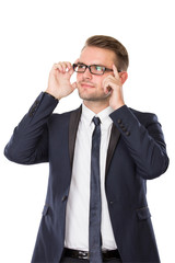 Businessman thinking, look away, finger on his glasses