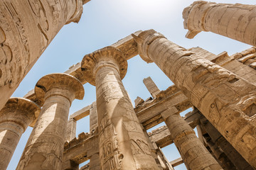 Capitals and pillars of the Great Hypostyle Hall from the Precinct of Amun-Re in Karnak temple complex, Luxor, Egypt.