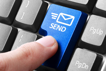 hand press send button on keyboard