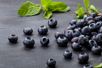 fresh blueberries on black board for background