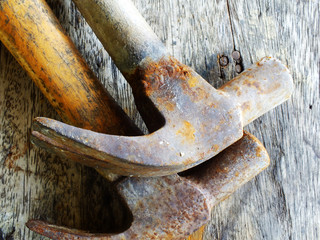 old rusted tools on wooden table