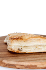 Bakery pastry with cheese on the wooden board