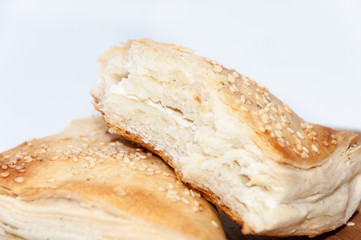 Puff pastry with cheese on the wooden board