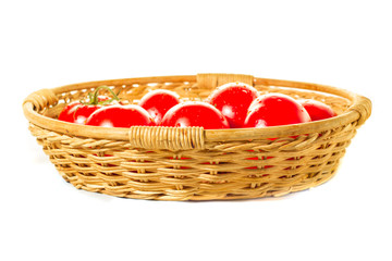 Fototapeta na wymiar Garden tomatoes basket on white background