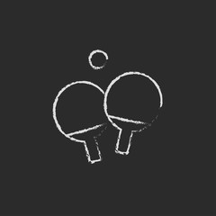 Table tennis racket and ball icon drawn in chalk.