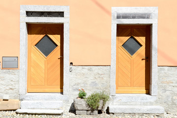 Fototapeta premium Doors of a house at Giornico on Leventina valley