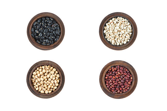 Red Beans, black beans, millet and black eyed peas in wooden bow