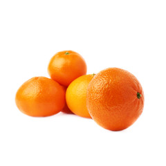Pile of multiple ripe fresh juicy tangerines, isolated over the