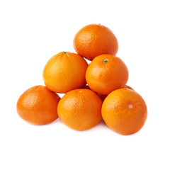 Pile of multiple ripe fresh juicy tangerines, isolated over the