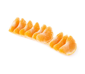 Line of fresh juicy tangerine fruit isolated over the white