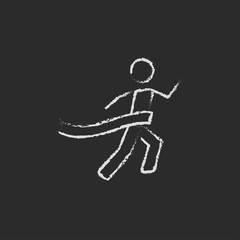 Winner and finish line icon drawn in chalk.