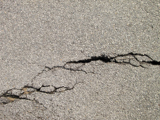 Obraz premium cracked asphalt background