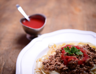 Low angle view of a serving of Italian spaghetti with a meat bas