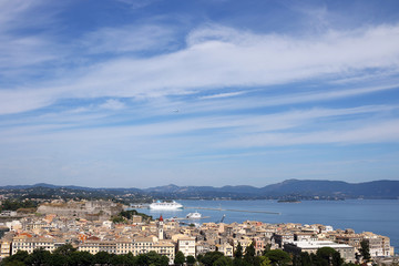 Fototapeta na wymiar Corfu town and port with cruiser cityscape