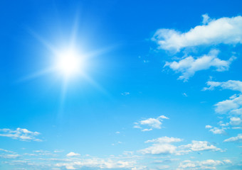 Obraz na płótnie Canvas Blue sky with clouds and sun.