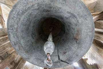 Old broken bell in a Christian church in Toledo, Spain