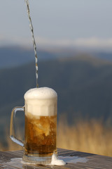Pouring lager beer