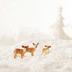 Snow landscape with deers