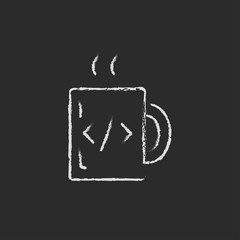 Cup of coffee with a code sign icon drawn in chalk.
