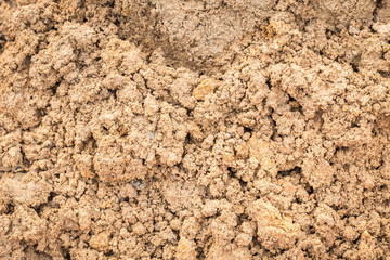 Pile of red soil in construction site