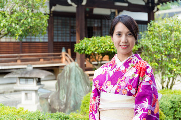 Woman in Japanese temple with kimono