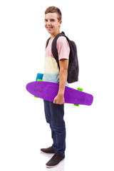 Portrait of a school boy holding a skateboard and notebooks, iso