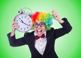 Funny clown with clock on white