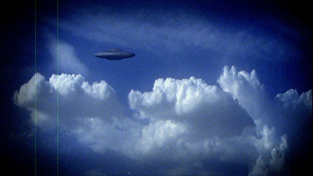 UFO 001: Scratchy footage of a UFO flying saucer.
