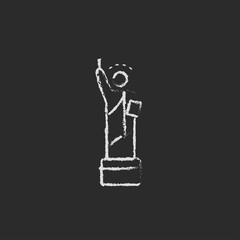 Statue of Liberty icon drawn in chalk.