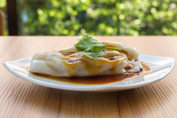 spring rolls with sweet sauce, vegetables and in noodle tube