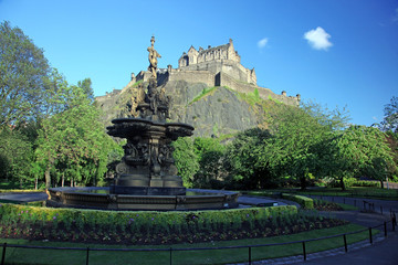 Fountain and Edinburgh Castle , Scotland, UK